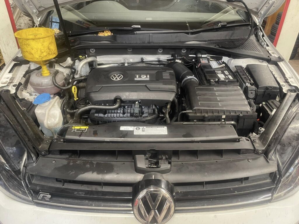Engine bay during a car service at Woodside Garage, New Mills