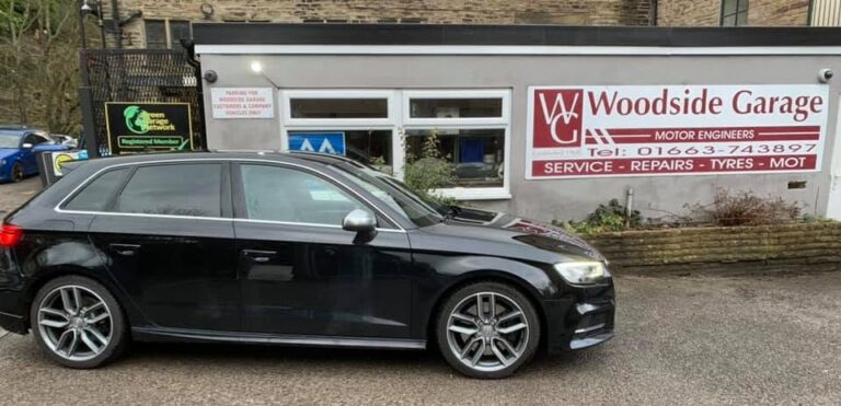 A customer's car outside Woodside Garage, New Mills
