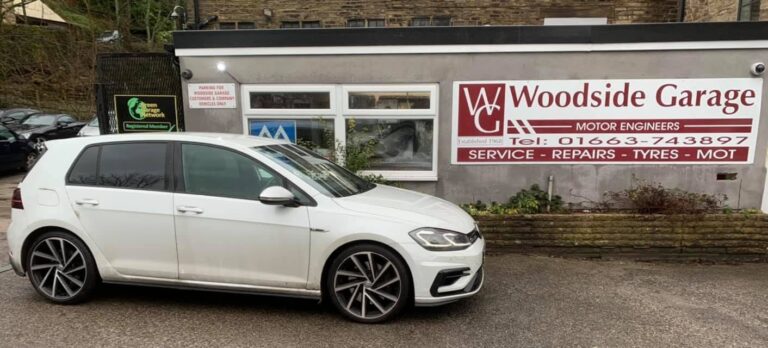 A customer's car outside Woodside Garage, New Mills