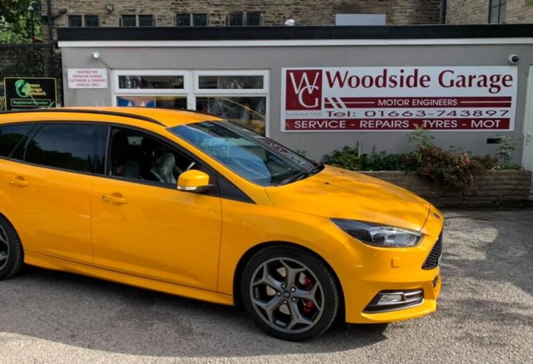 A customer's car outside Woodside Garage, New Mills