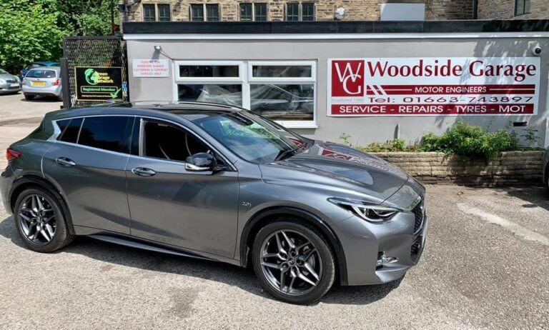 A customer's car outside Woodside Garage, New Mills