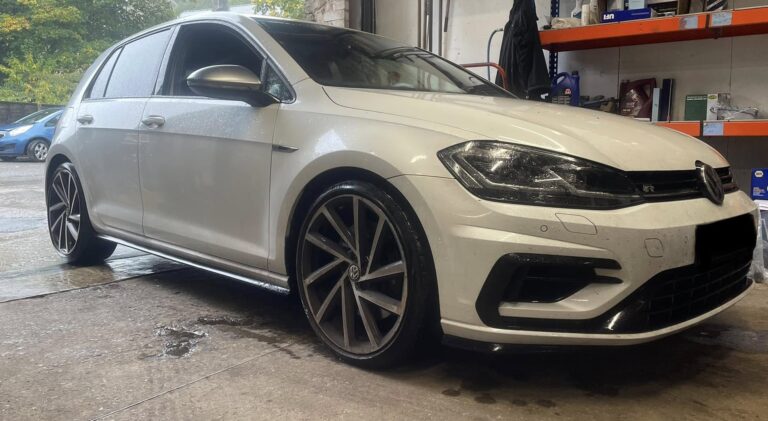 A car in the Woodside Garage workshop for its MOT and checks