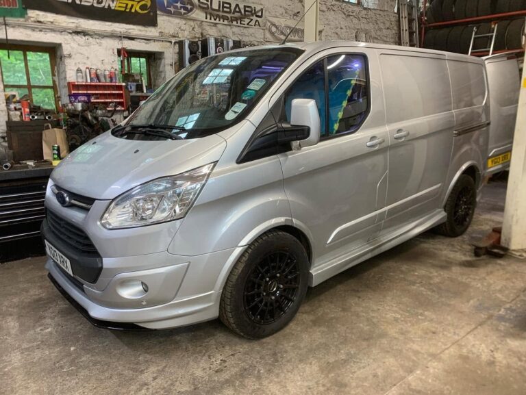 A van in the workshop at Woodside Garage